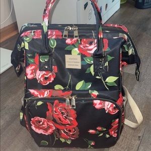 Black backpack with roses